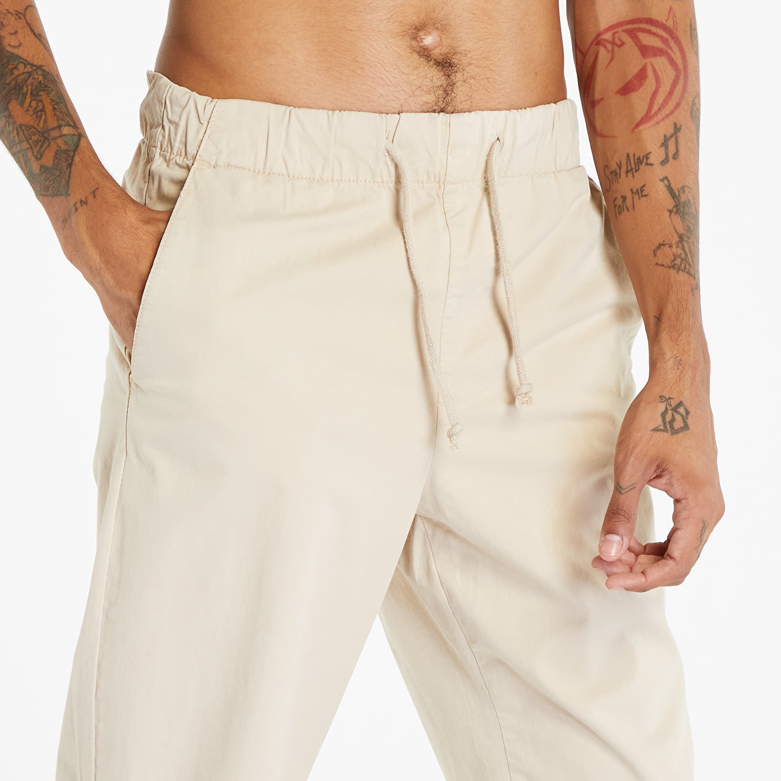 Jeans and trousers Urban Classics Straight Slit Trouser Softseagrass