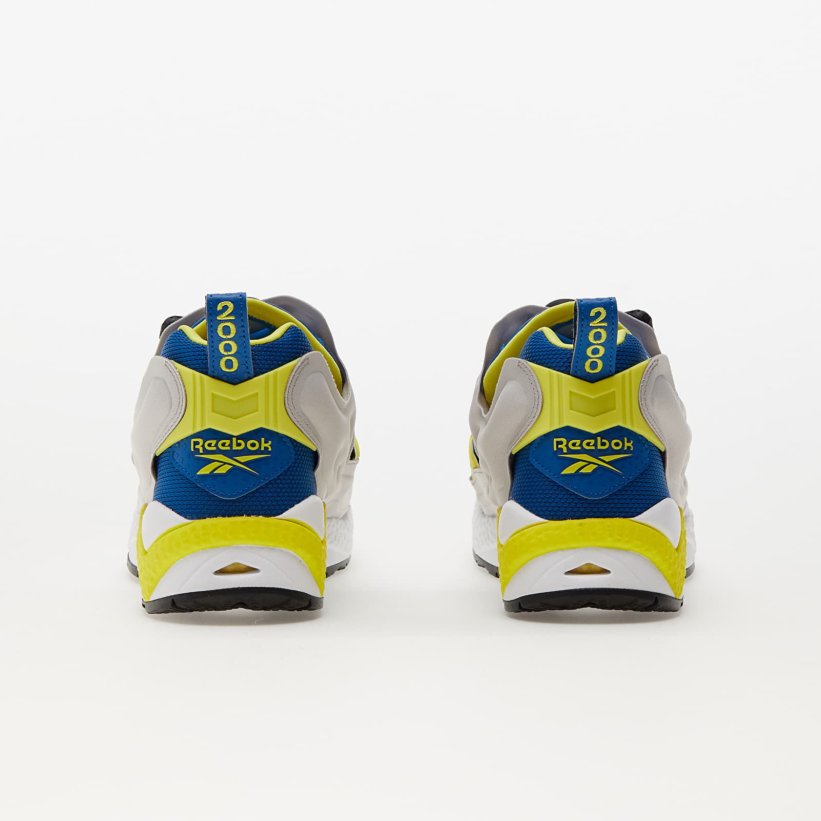 Tuta reebok blu e gialla on sale