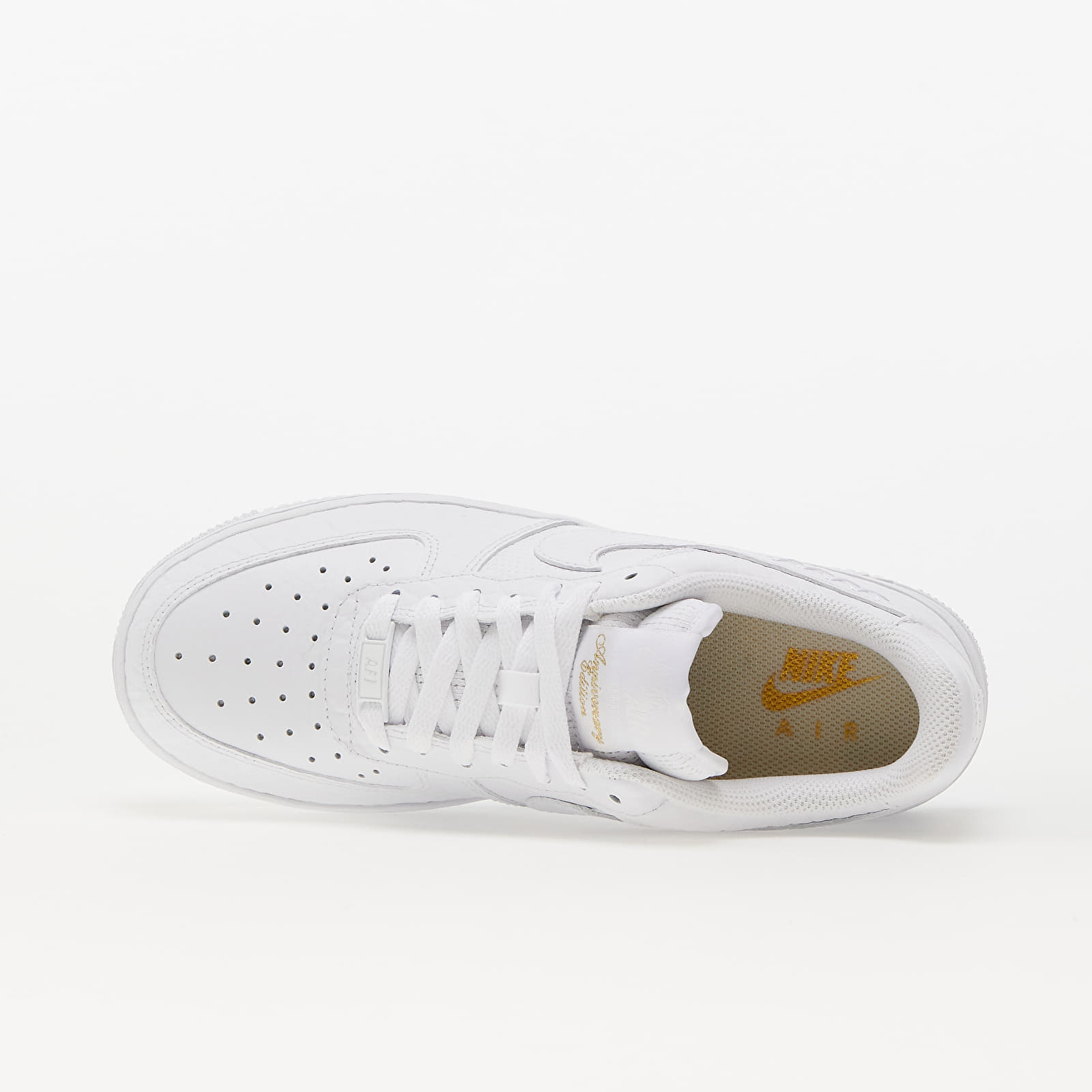 Nike white with gold online