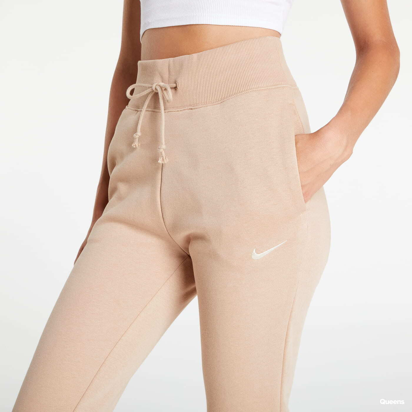 Nike essentials best sale beige slim joggers