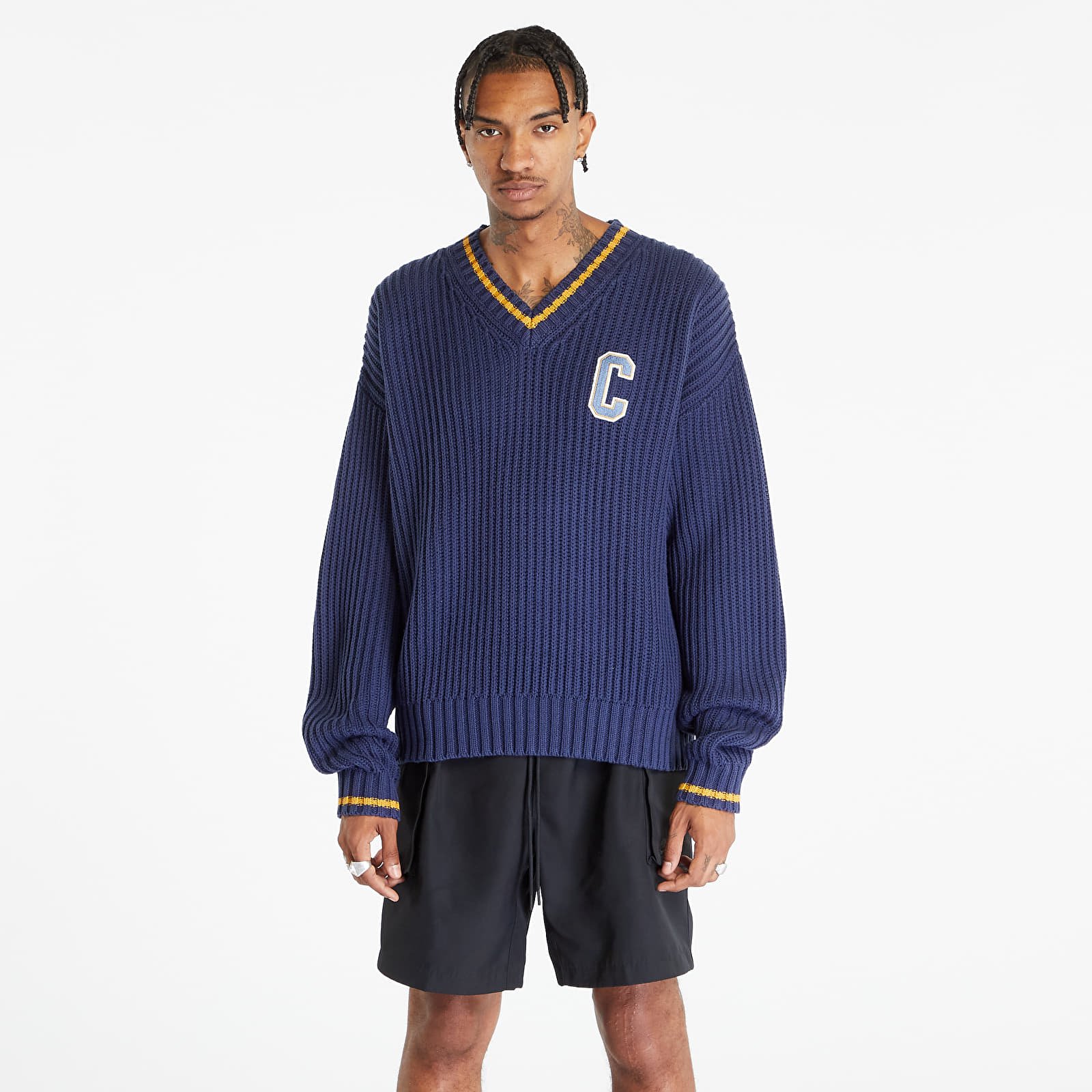 Champion sweater material sales crossword