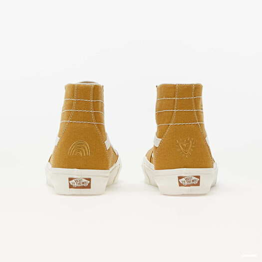 Mustard yellow vans standing high tops