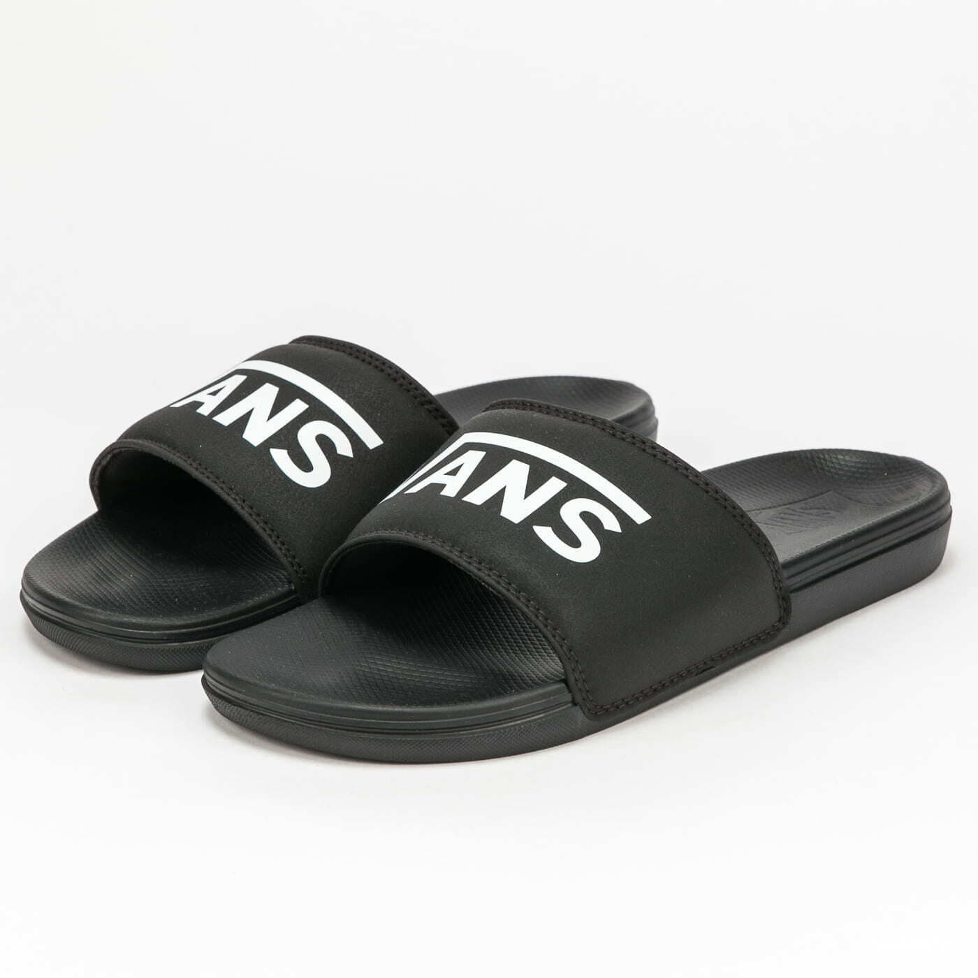 All black vans slides online