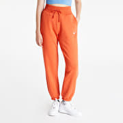 Orange nike track pants online