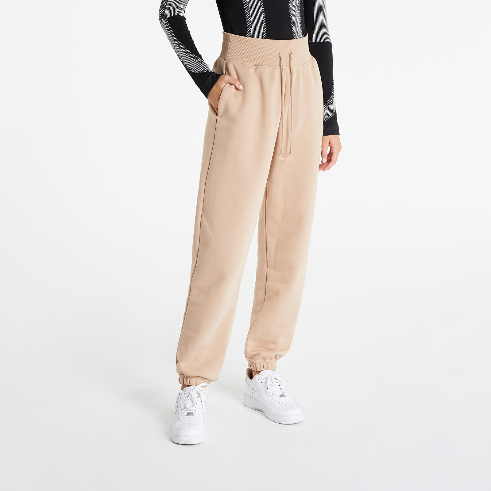 Džínsy a nohavice Nike Sportswear Phoenix Fleece Women's High-Waisted Oversized Sweatpants Hemp/ Sail