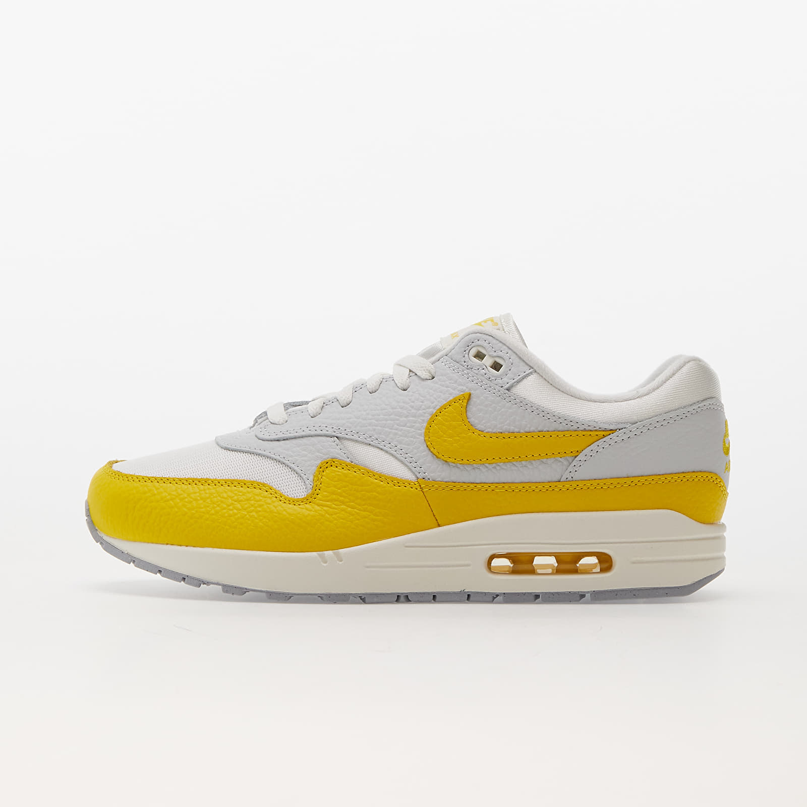 Herensneakers en -schoenen Nike Air Max 1 Photon Dust/ Tour Yellow-Wolf Grey-Sail