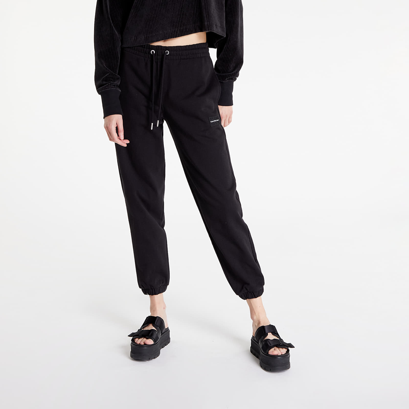 Joggebukser CALVIN KLEIN JEANS Badge Cuffed Jogger Pants Black