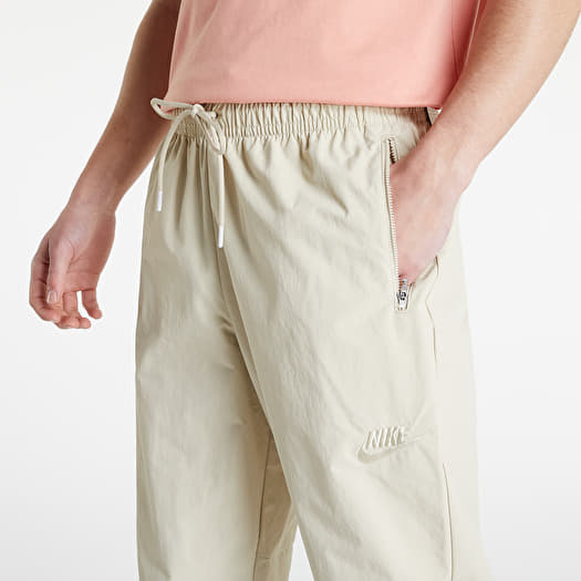 Jeans and trousers Nike Sportswear Revival Woven Track Pants Rattan Queens