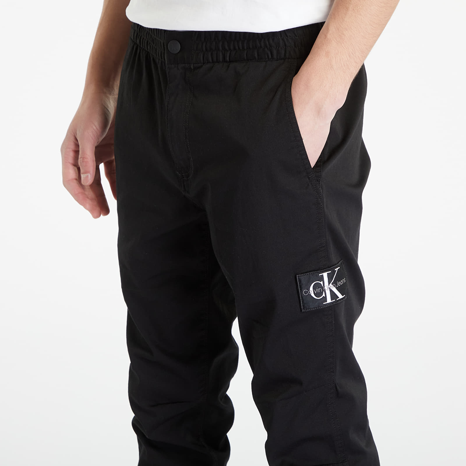 Pants and jeans CALVIN KLEIN JEANS Monologo Badge Casual Chinos