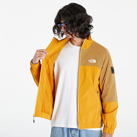 The north face yellow windbreaker hot sale