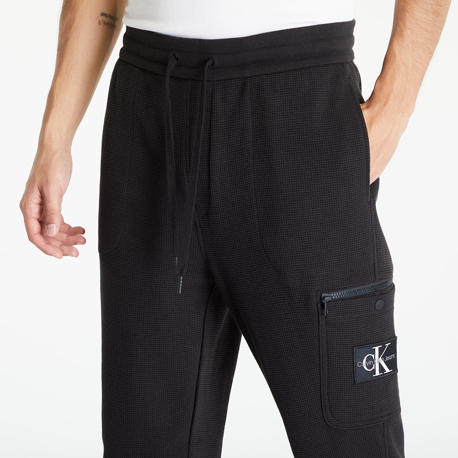 Tepláky Calvin Klein Jeans Badge Waffle Hwk Pants Black