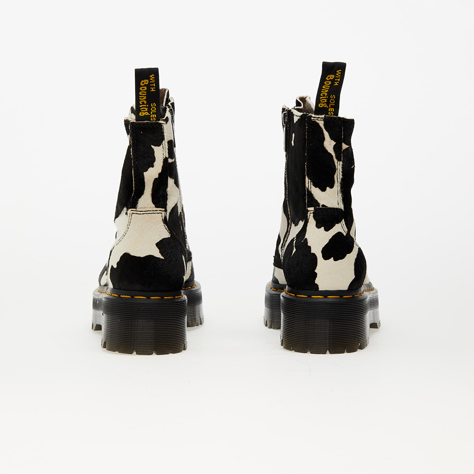 Cow print doc martens sales
