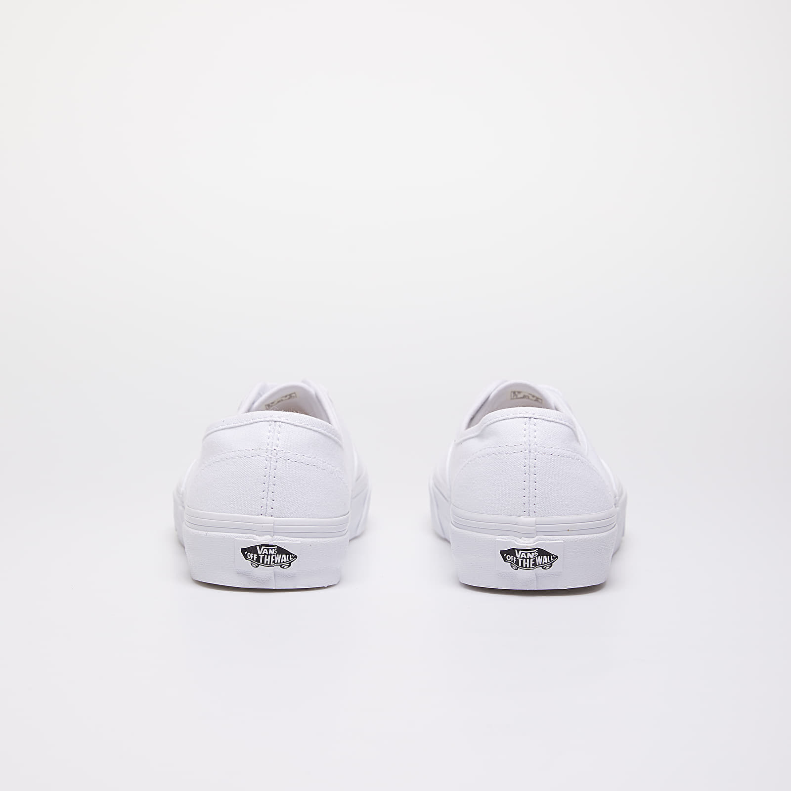 All white vans slip ons store