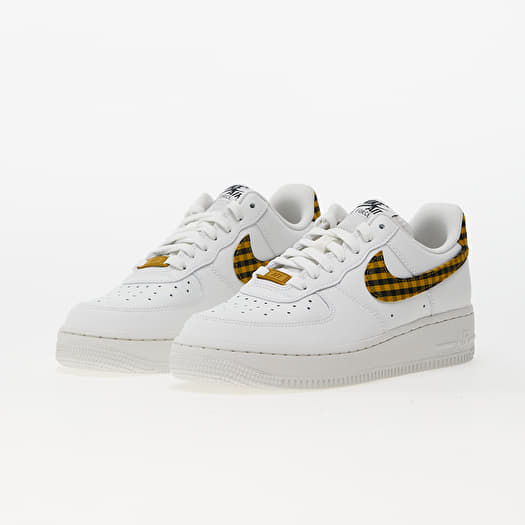 Black and yellow nikes womens sales