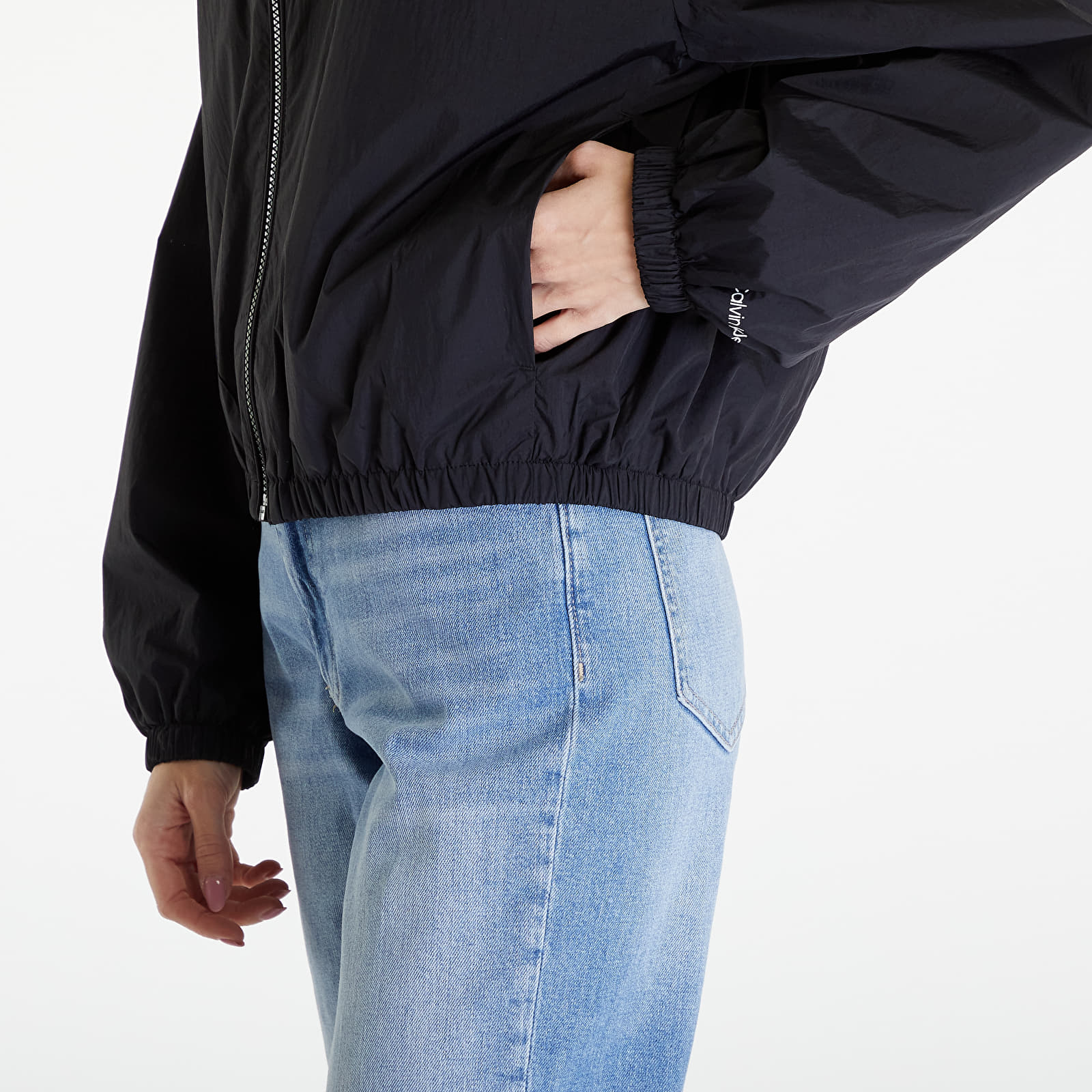 Větrovky Calvin Klein Jeans Logo Drawstring Windbreaker Black