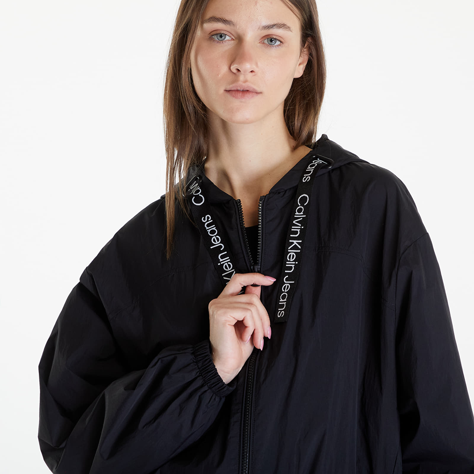 Větrovky Calvin Klein Jeans Logo Drawstring Windbreaker Black