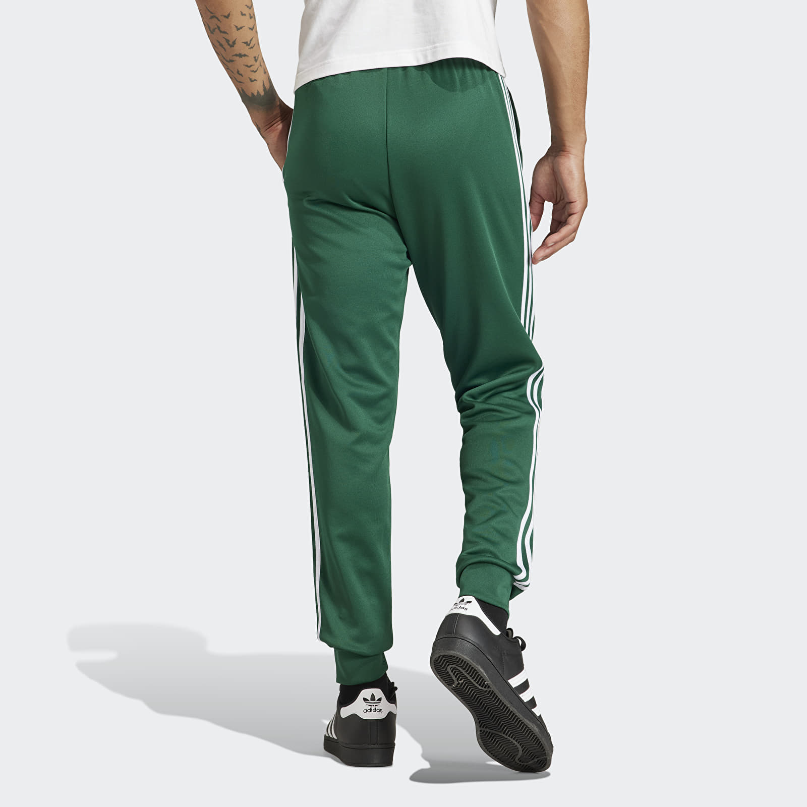Collegiate green adidas pants hotsell