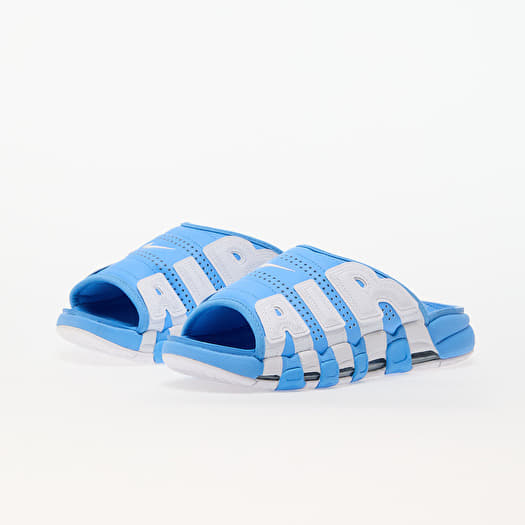 Nike slippers blue and white hotsell