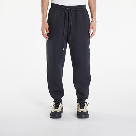 Heren broeken Nike Tech Fleece Reimagined Men s Fleece Pants Black Queens