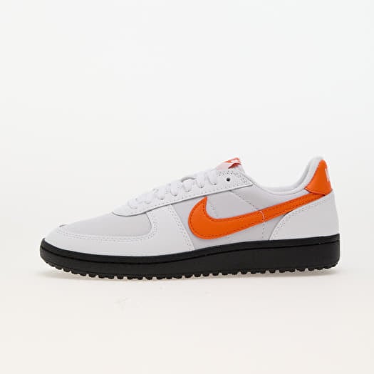Black white and orange nikes store