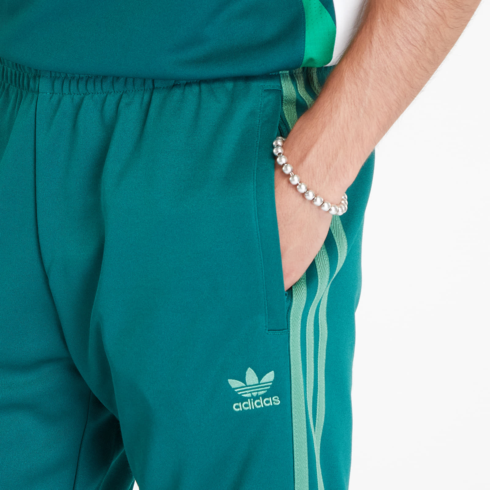 Adidas originals sst track pants green store