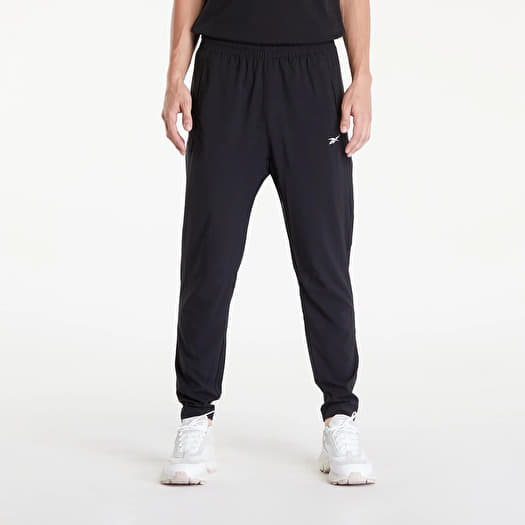 Pánské kalhoty Reebok Id Train Woven Pant Black Queens