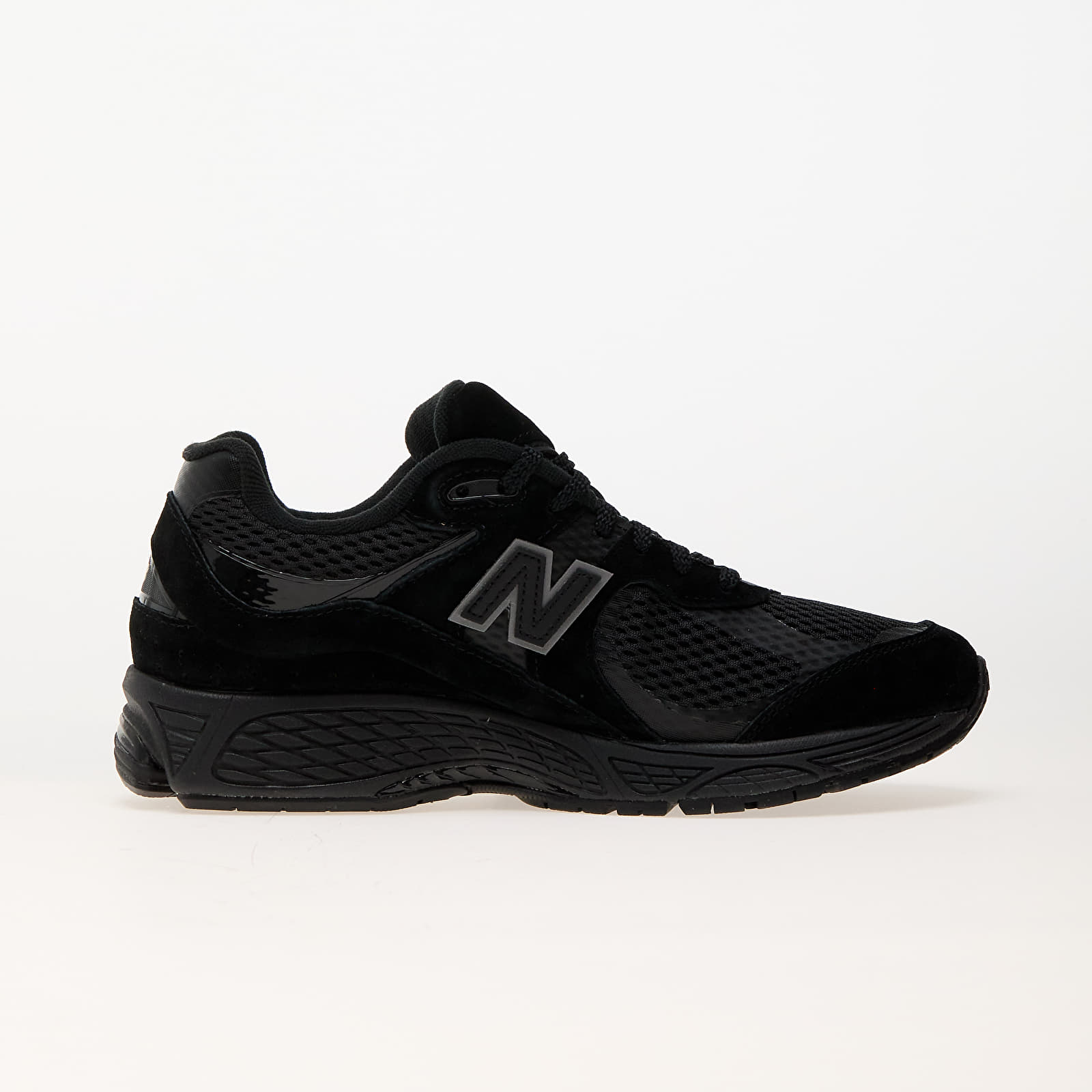 Chaussures New Balance 2002R Black Queens