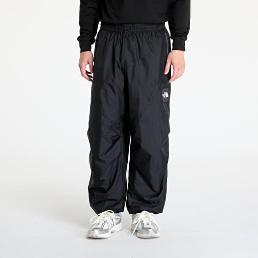 Men s trousers The North Face x Yinka Ilori Windshell Pant Tnf Black Queens