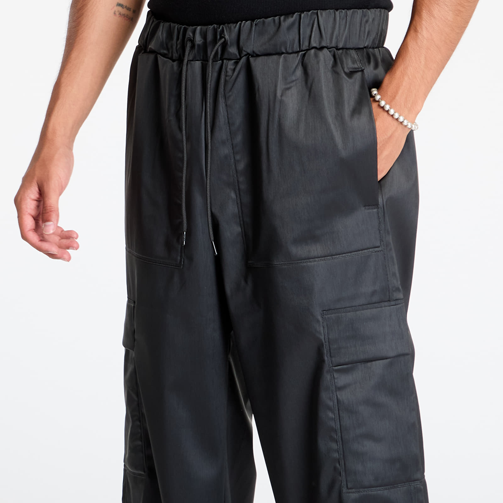 Teksad ja püksid Rains Cargo Rain Pants Wide W3 UNISEX Black Grain
