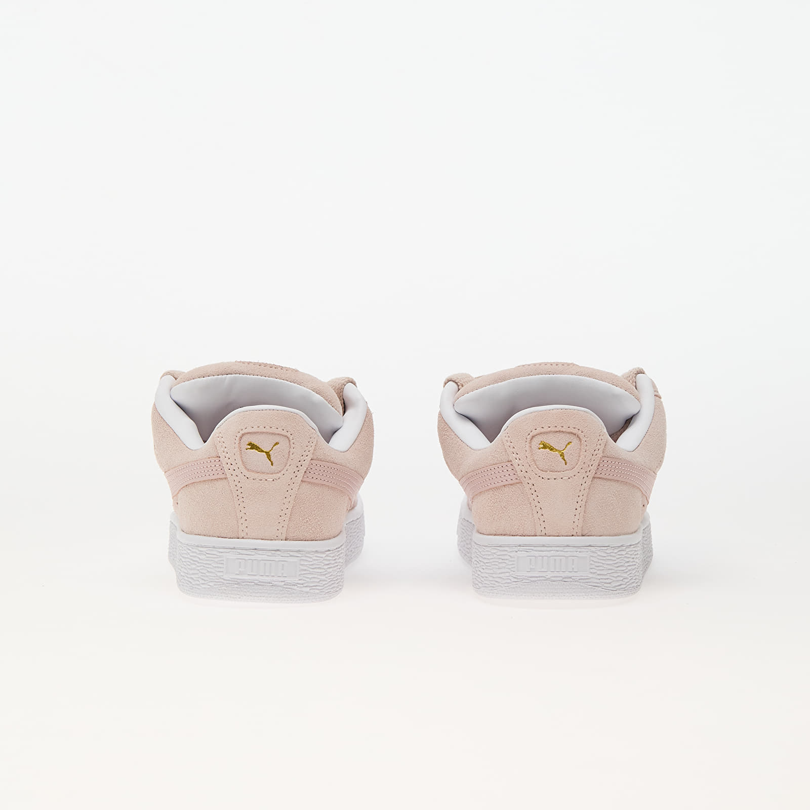 Suede pink pumas deals