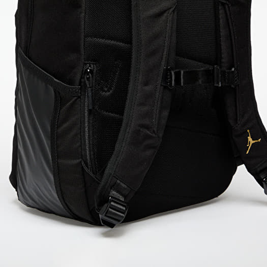 gold and black jordan backpack
