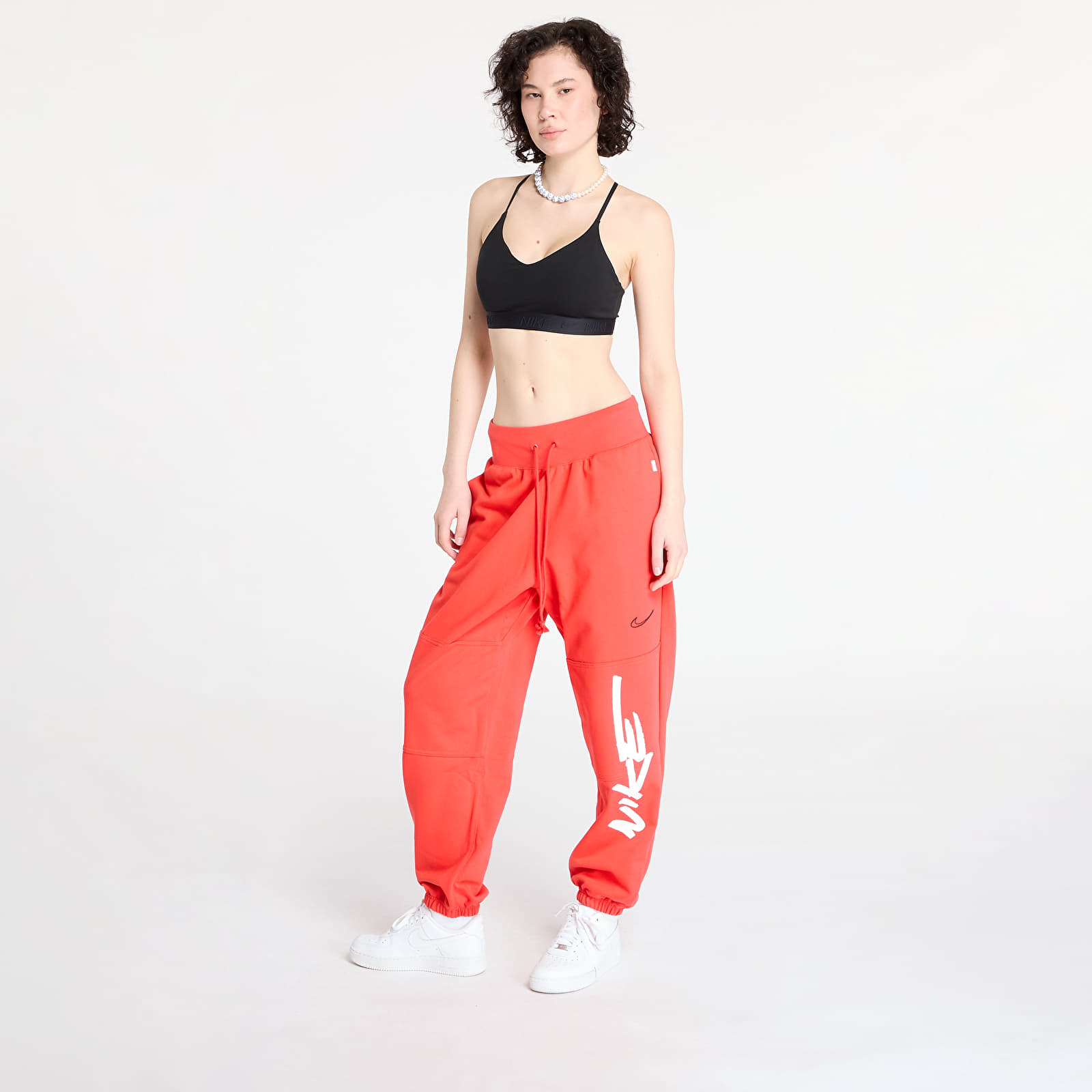 Women's Sweatpants Nike Sportswear Breaking Mid-Rise Oversized French Terry Pants Light Crimson