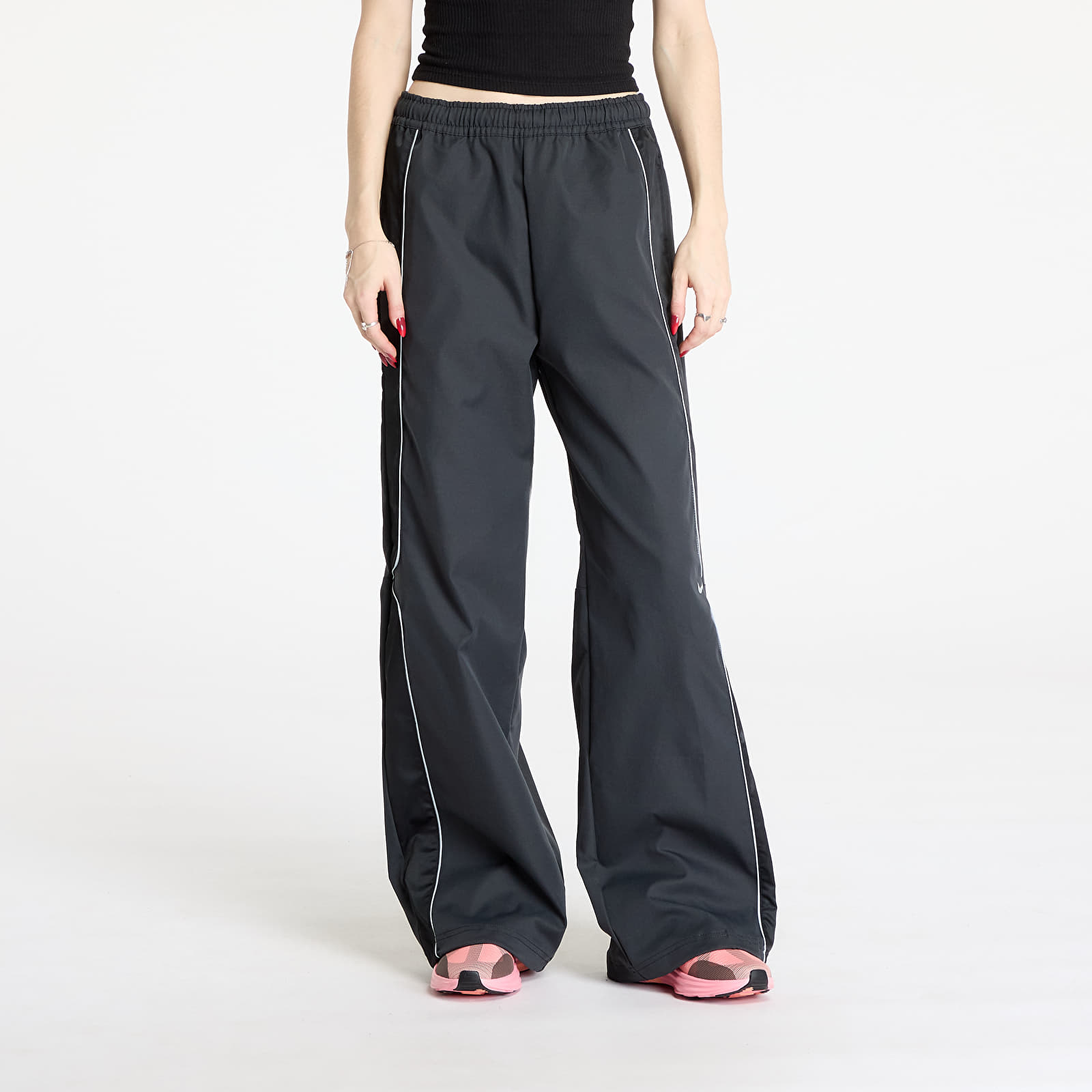 Pantalones de mujer Nike Sportswear Women's Woven Pants  Black/ Black