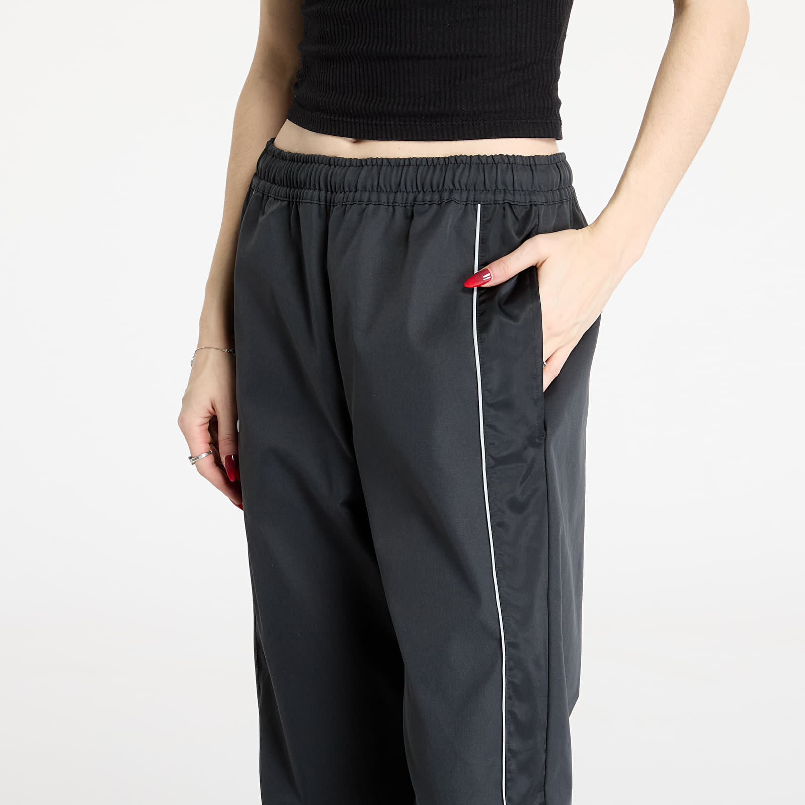 Pantalones de mujer Nike Sportswear Women's Woven Pants  Black/ Black