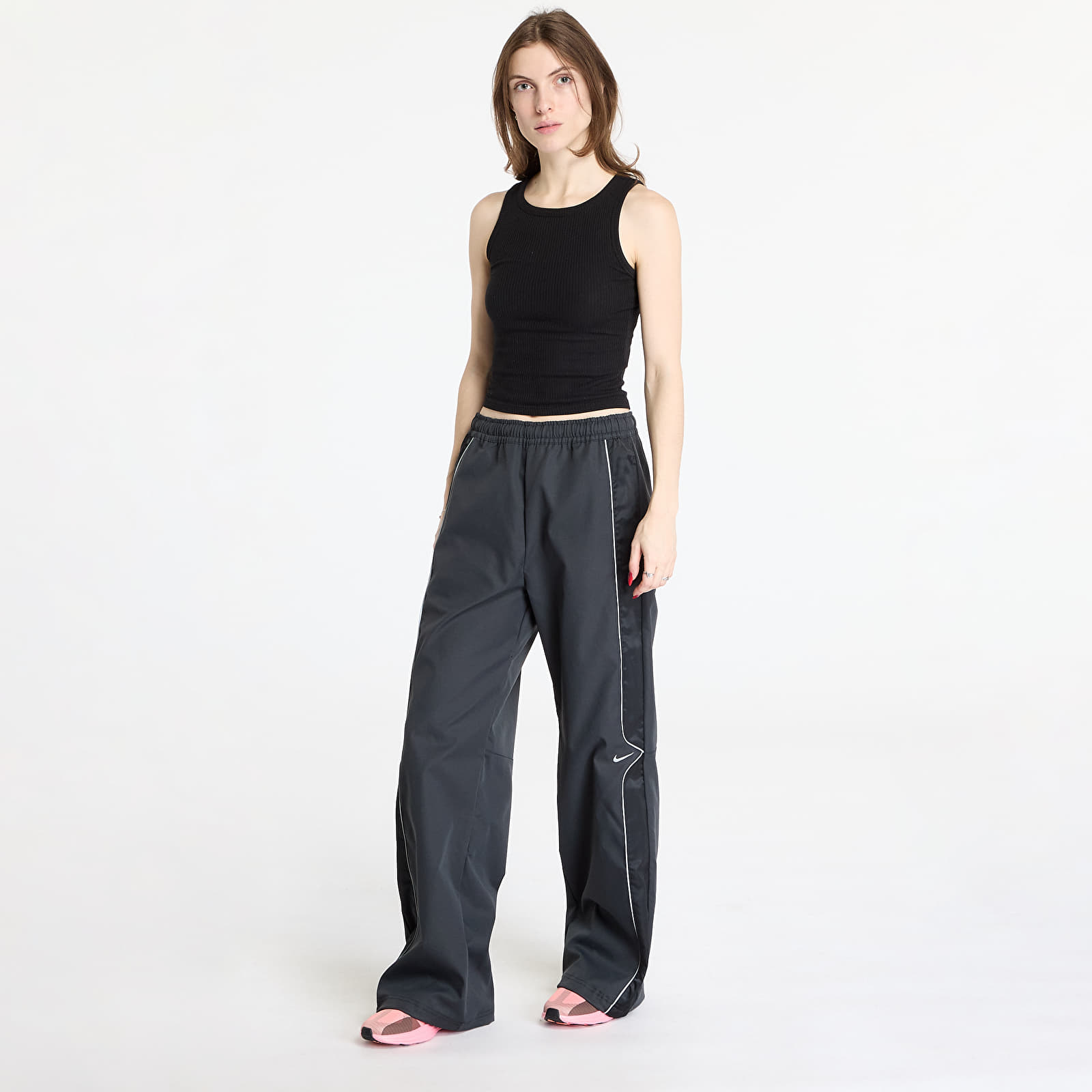 Pantalones de mujer Nike Sportswear Women's Woven Pants  Black/ Black
