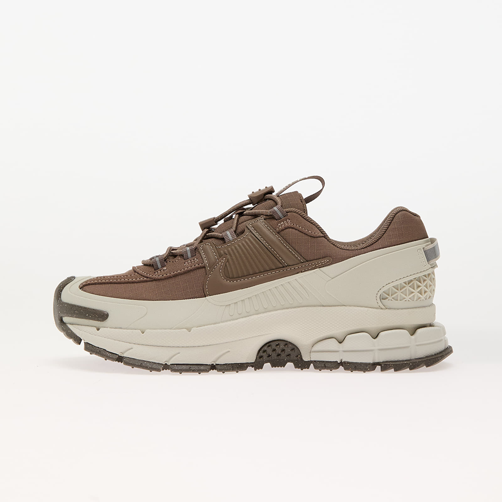 Naiste tossud ja kingad Nike W Zoom Vomero Roam Light Bone/ Mink Brown-Court Purple