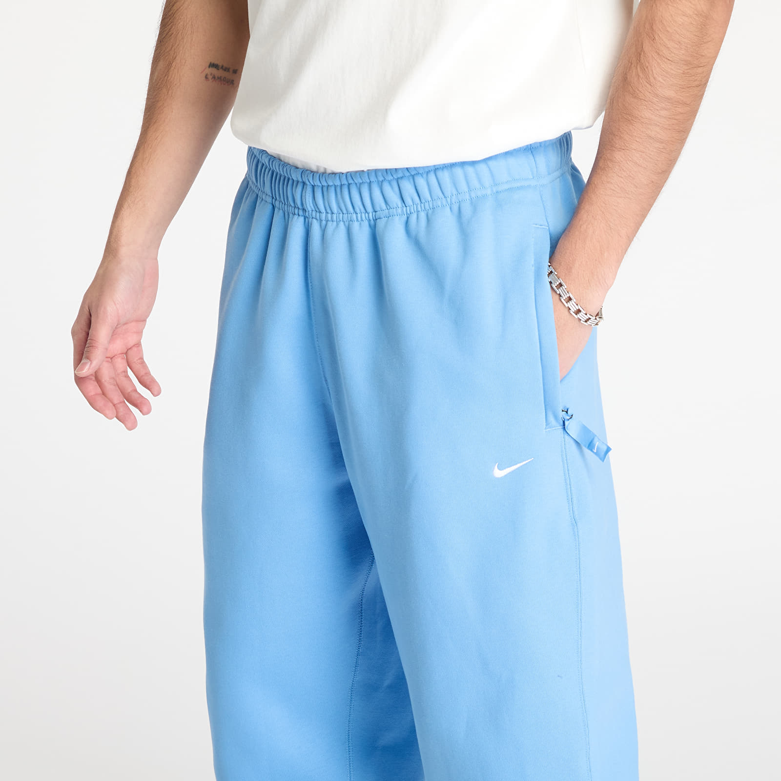 Meeste dressipüksid Nike Solo Swoosh Men's Fleece Pants University Blue/ White