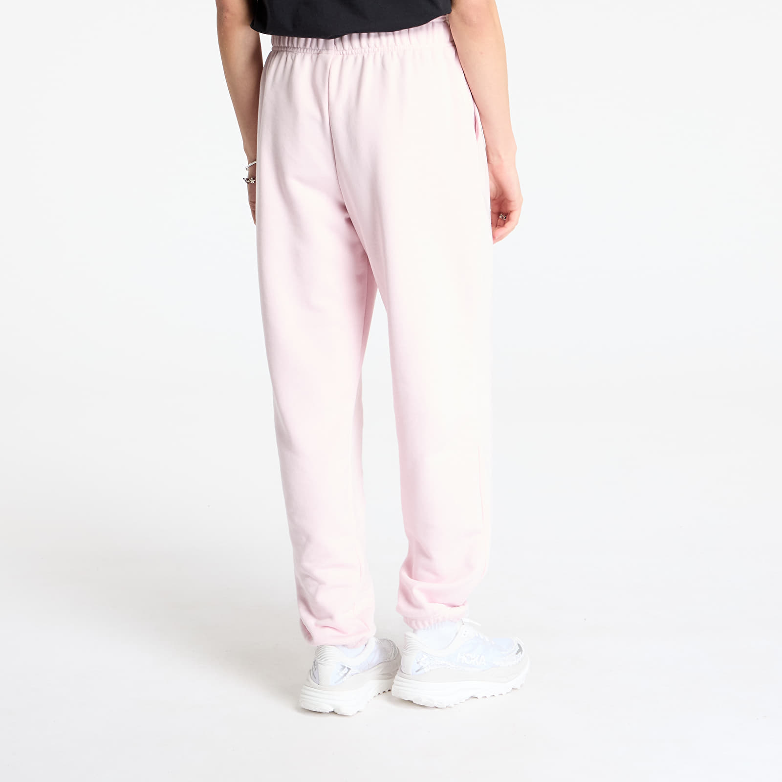 Tepláky New Balance Sport Essentials French Terry Jogger Pink