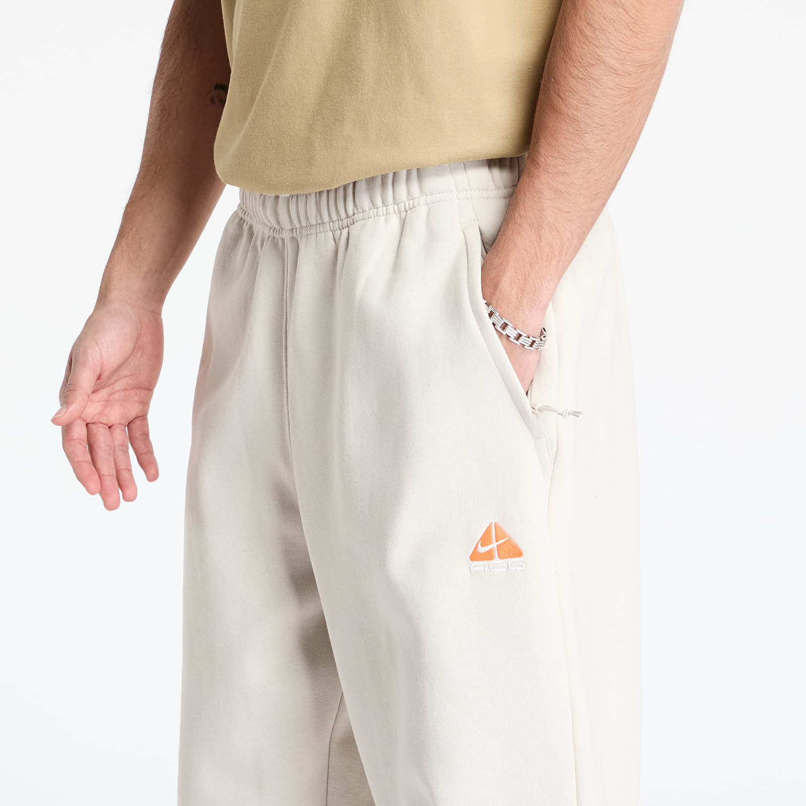 Meeste dressipüksid Nike ACG Therma-FIT Repel Tuff Fleece Lungs Pants Lt Orewood Brn/ Hyper Crimson