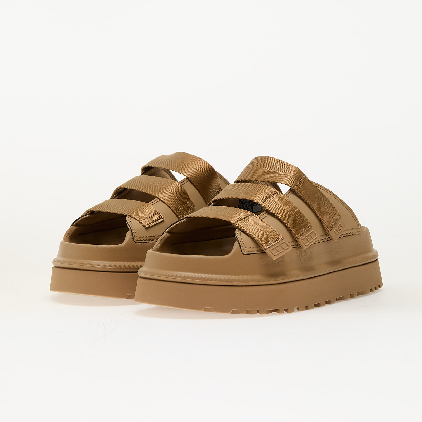 Moteriški sportiniai bateliai ir avalynė UGG W Goldenglow Slide Dark Sand