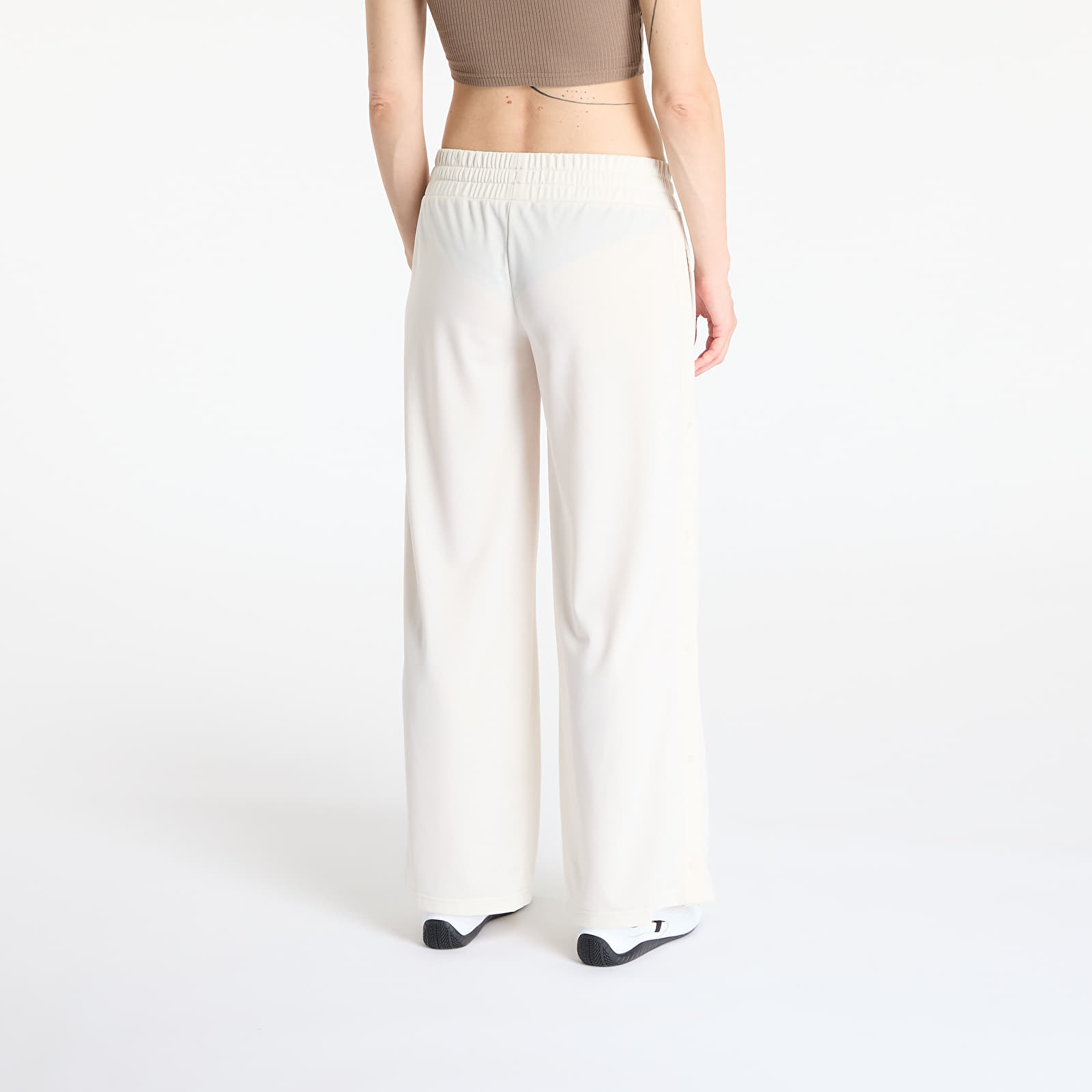 Pantalones de mujer Puma Wardrobe Essentials Low Rise Popper Pants Alpine Snow