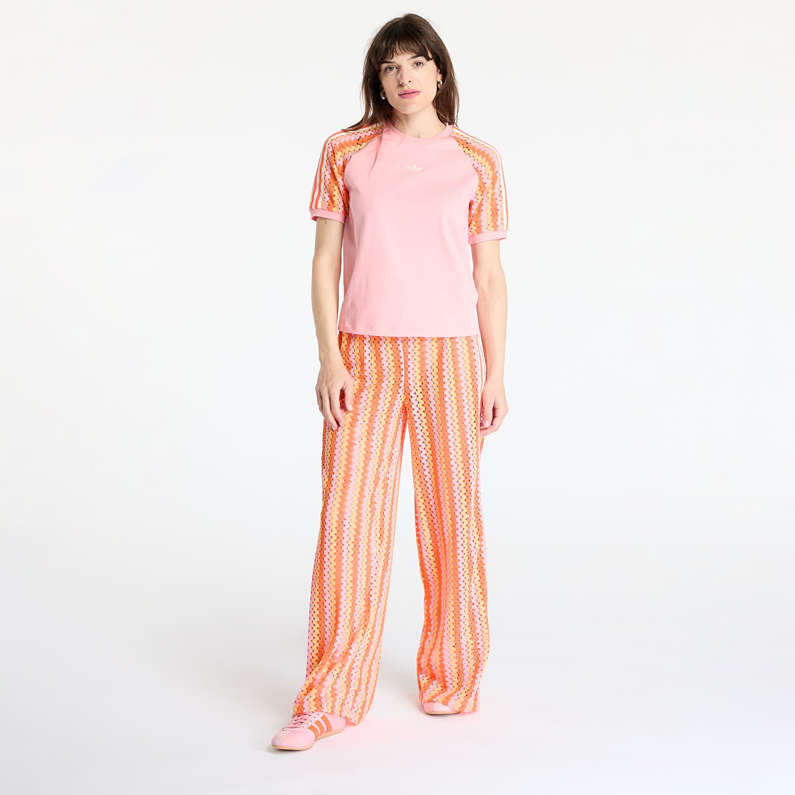 Pantalons pour femmes adidas Originals Summer Glow Firebird Track Pant Semi Lucid Fuchsia/ Hazy Orange/ Semi Solar Orange