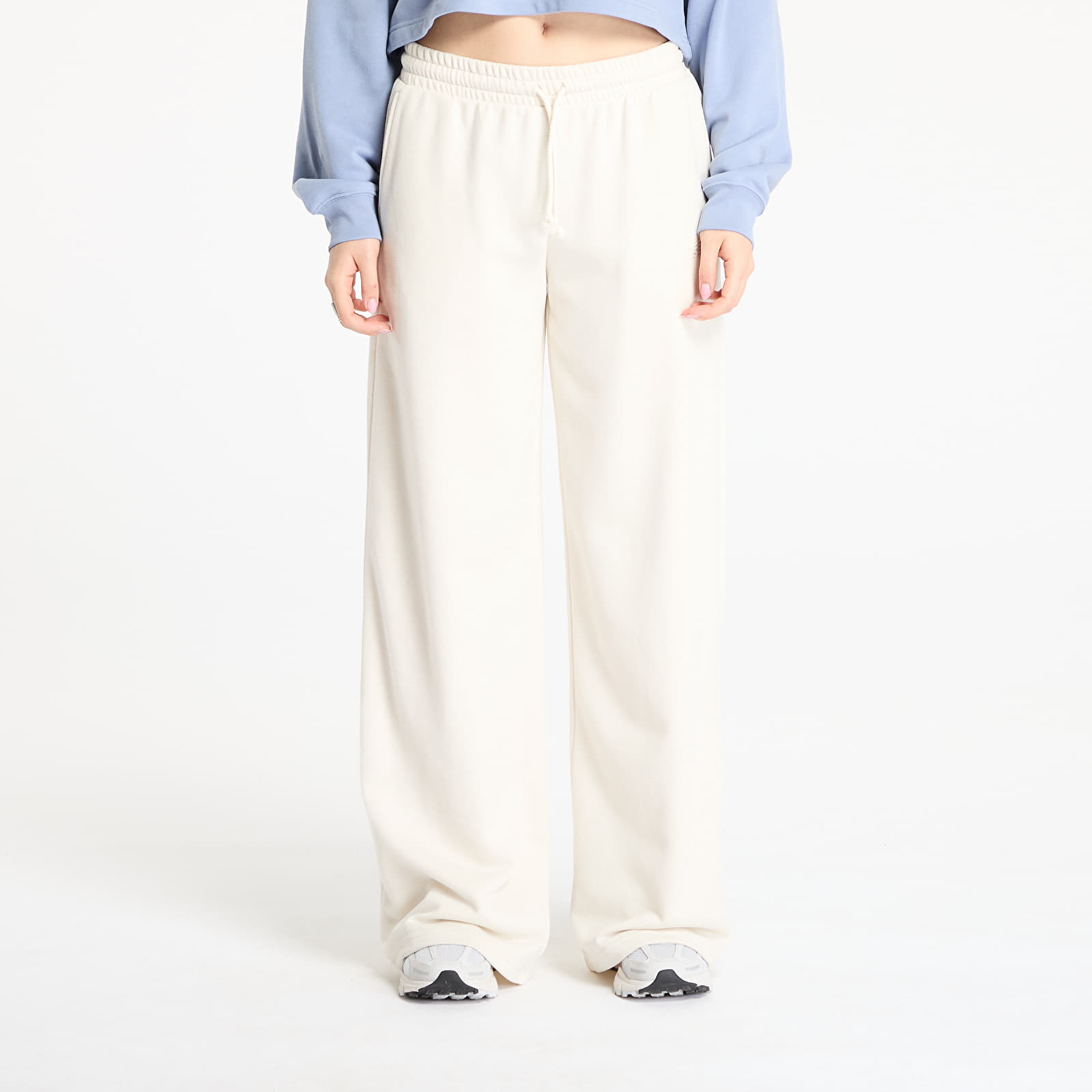 Pantalones de chándal para mujer New Balance Coastal Fleece Pant Linen