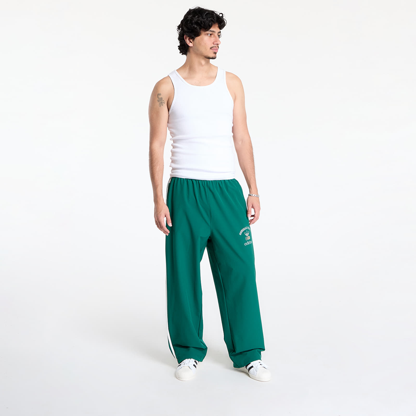 Muške hlače adidas Originals Dept. Woven Firebird Track Pant Collegiate Green