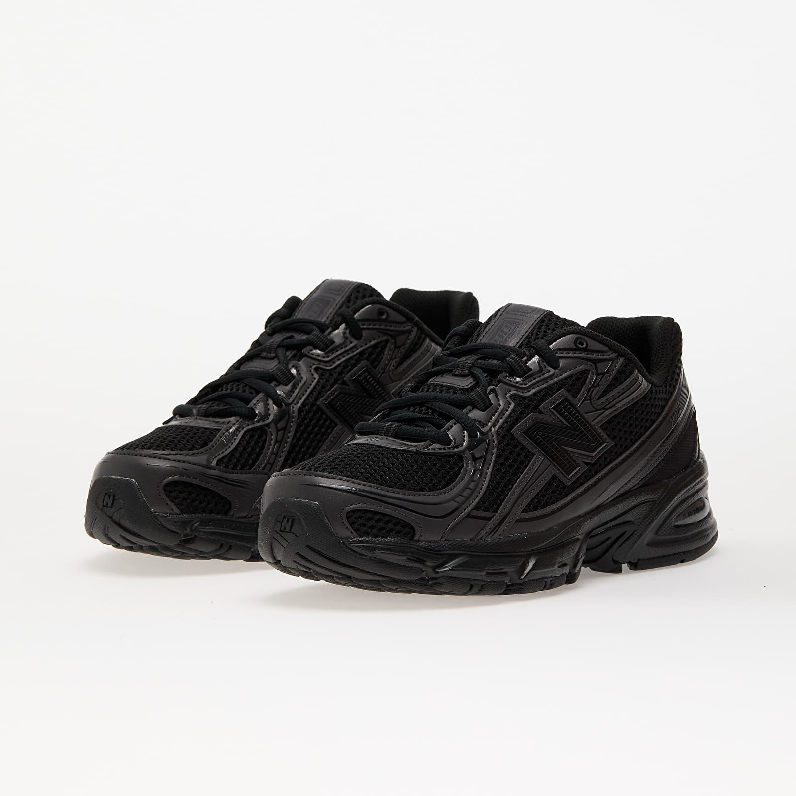 Meeste tossud New Balance 740 Black/ Black Cement