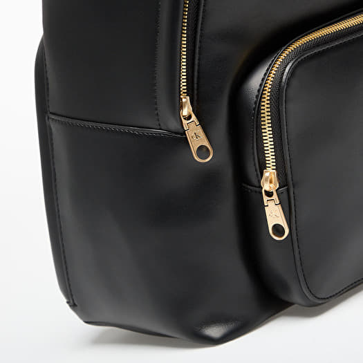 calvin klein leather backpacks Estelle Novelty-Backpack, Caramel minimalist form with an embossed logo at the front Calvin Klein Sandi Slim Backpack