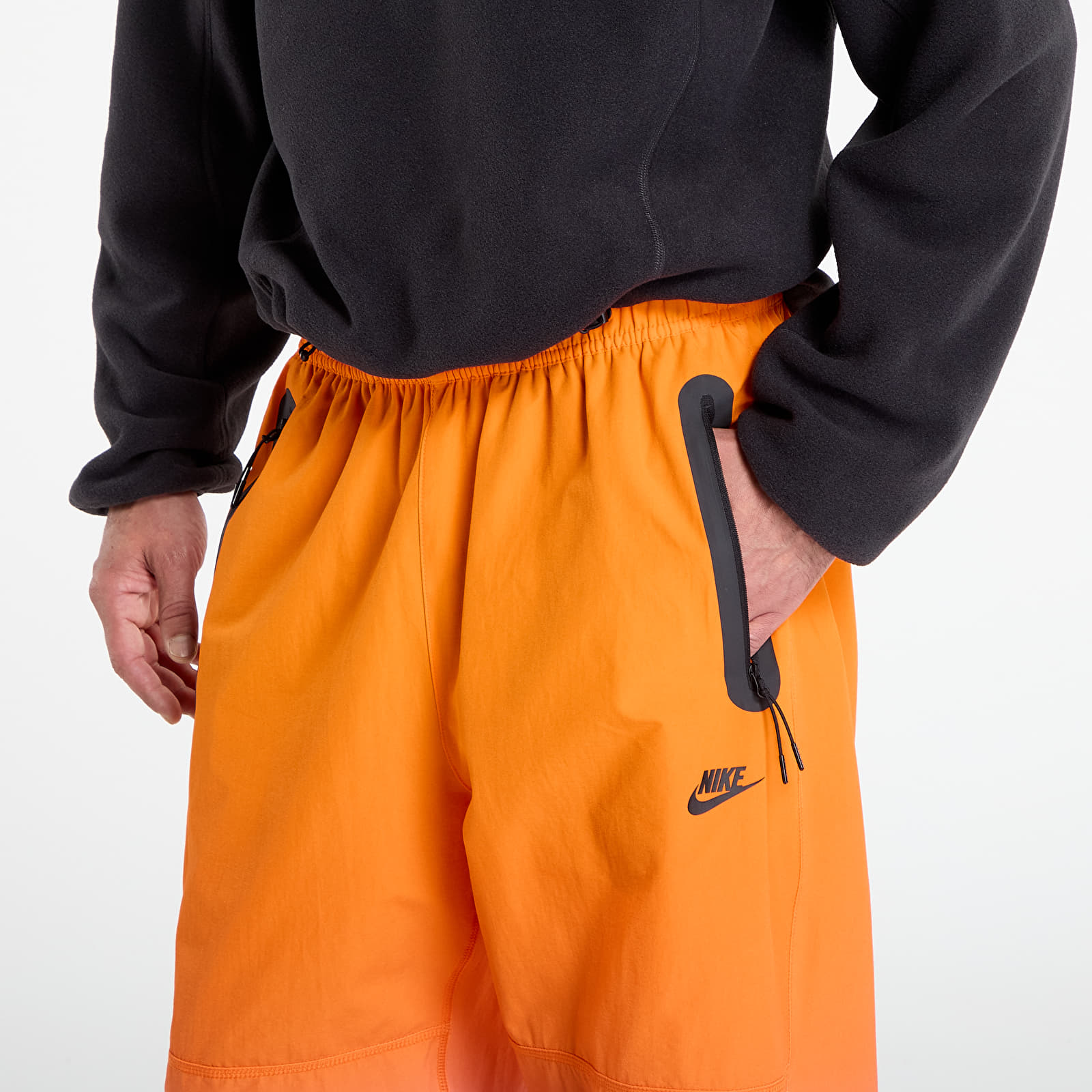 Pantaloni uomo Nike Tech Men's Woven Pants Game Royal/ Safety Orange