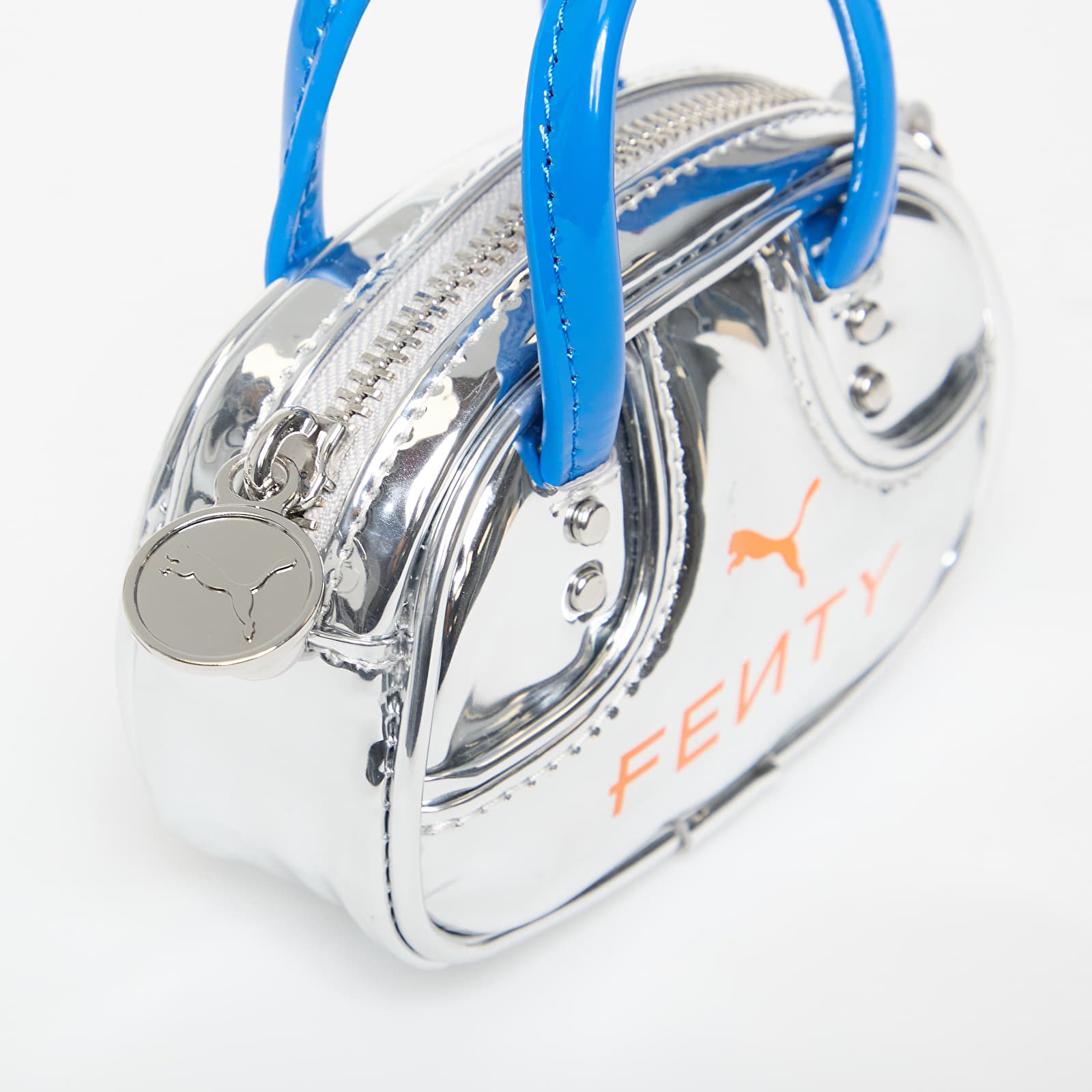 Muud aksessuaarid PUMA x FENTY Pocket Grip Bag PUMA Silver/ Racing Blue/ Rickie Orange