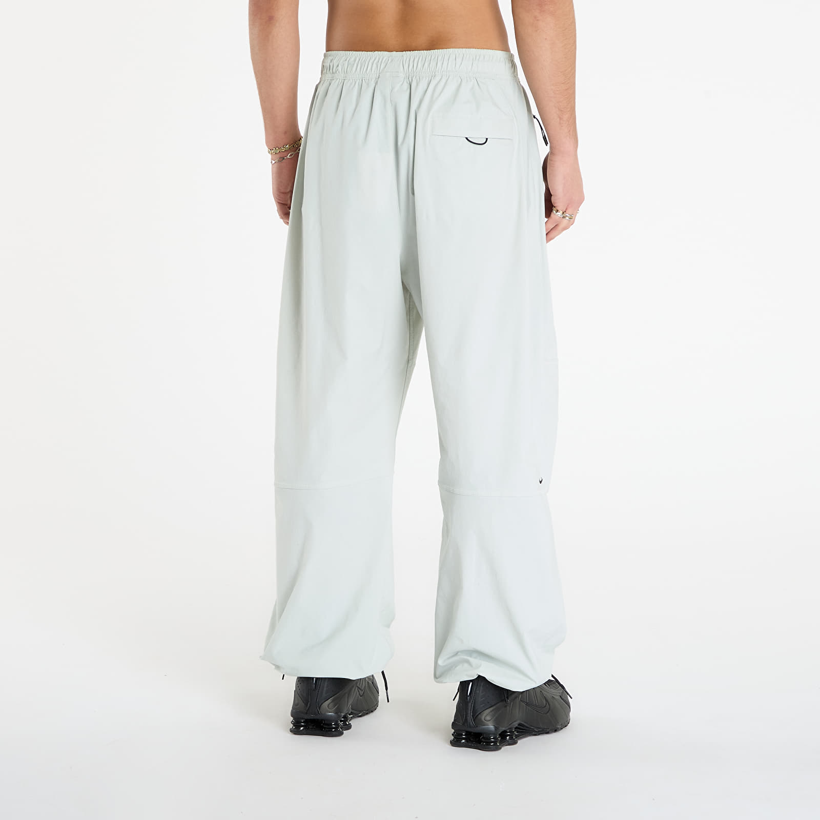 Pánské kalhoty Nike Tech Men's Woven Oversized Pants Light Silver/ Light Silver/ Black