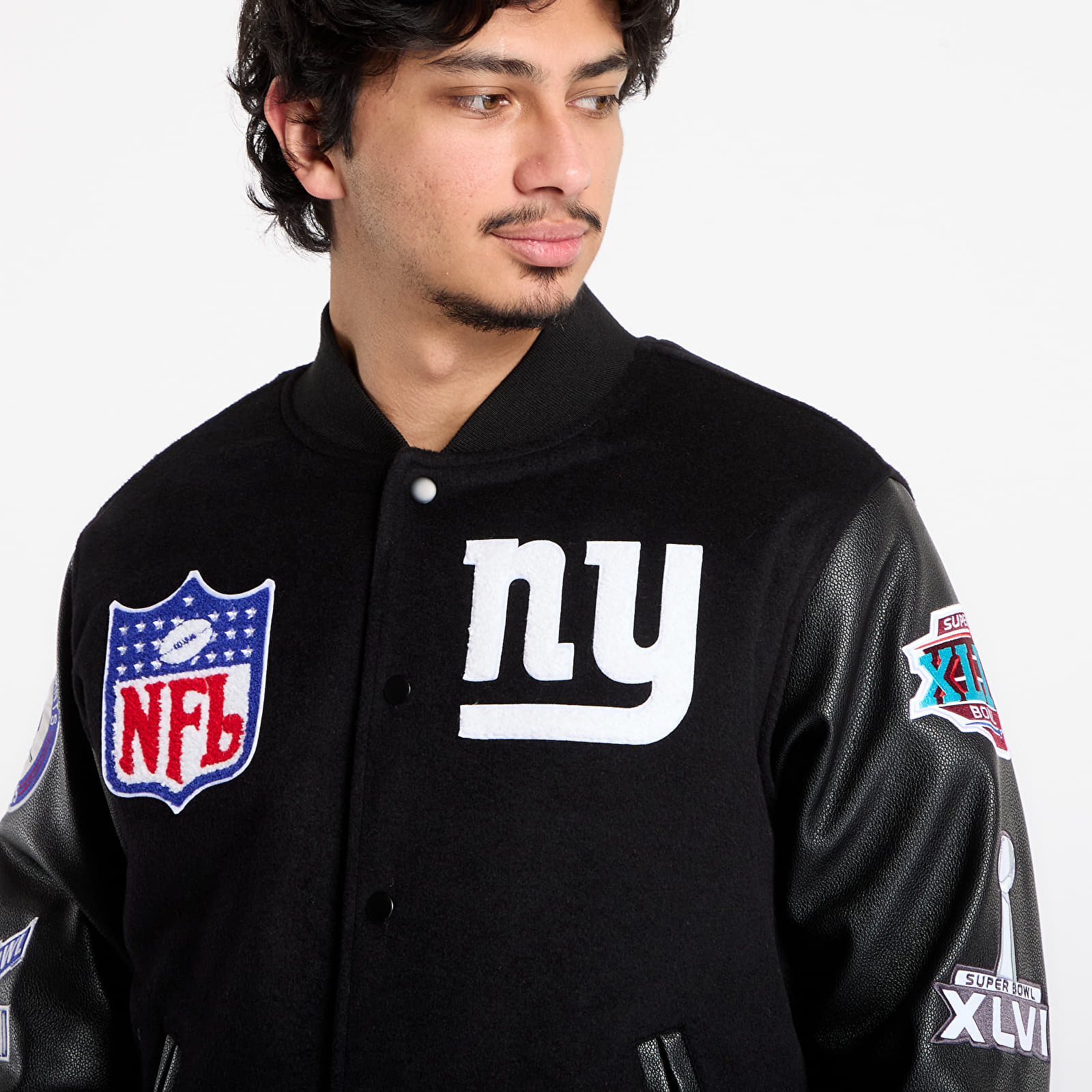 Pánské bundy Mitchell & Ness NFL Blackout Collection Varsity Jacket New York Giants Black